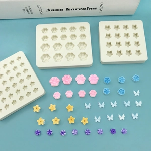 Mini food grade silicone mold set featuring cat paw star and butterfly designs for DIY crafts
