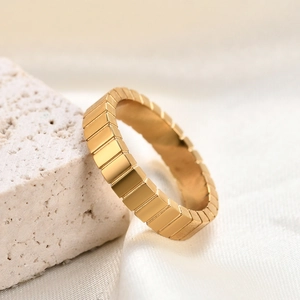4MM gold minimalist stainless steel ring with geometric step texture on white silk