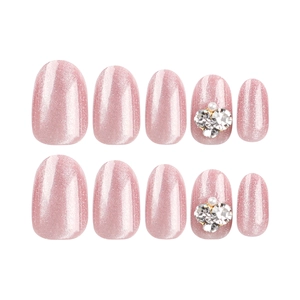 Pink cat eye press-on nails set with oval shape, sparkling rhinestones, and pearls