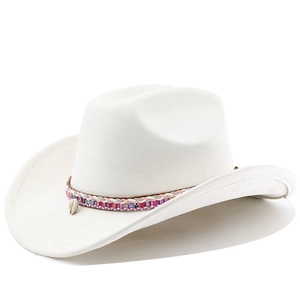 Detail of white felt western cowboy hat featuring bohemian braided band and shell accent