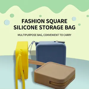 Square silicone storage pouch for coins and earphones in yellow, blue, and khaki