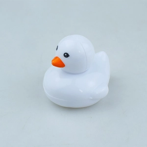 Detailed close-up of a white rubber duck toy with orange beak for creative play