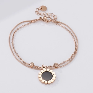 Elegant rose gold double-layered bracelet featuring a sunflower pendant and sleek snake chain