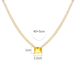 Detail view of 18k gold plated tennis necklace showing 40+5cm length and heart pendant size