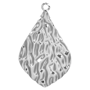Detailed close-up of a silver oval pendant with a unique hammered bark texture finish