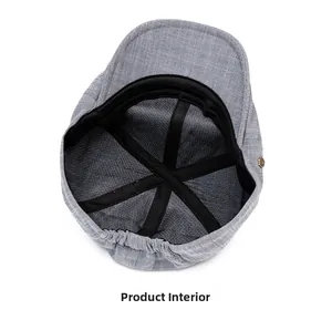 Détail intérieur de la casquette gavroche montrant le tissu gris et la bande élastique
