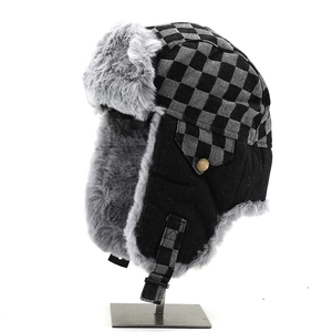 Winter checkered earflap hat with grey faux fur lining and windproof buckle closure