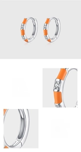 Detail of S925 sterling silver hoop earrings with orange enamel and 5A cubic zirconia
