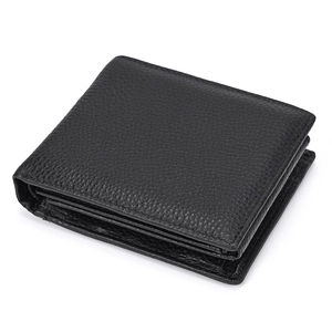 Close-up of black genuine leather wallet with lychee pattern texture and fine stitching