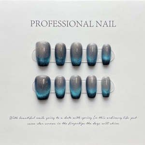 Blue cat eye press-on nails set in coffin shape with gradient glitter finish