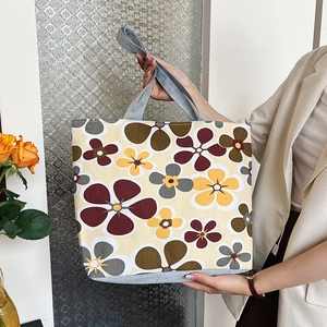 Minimalist canvas tote bag with vintage floral print and grey fabric handles for women