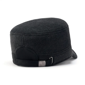 Close-up of adjustable metal buckle and thick wool fabric on men's winter cadet cap