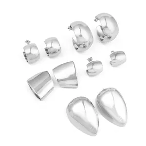 Polished silver irregular geometric stud earrings and hoop set for women on white