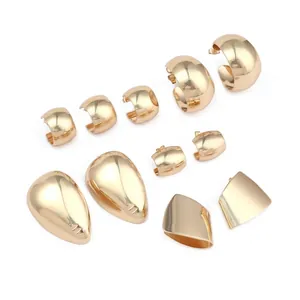 Polished gold irregular geometric earrings set with hoop and waterdrop designs