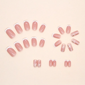 French marble press-on nails with gold foil accents and square-oval shape in nude pink