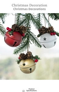 Christmas metal bells with pine cones and red berries hanging on a festive tree branch