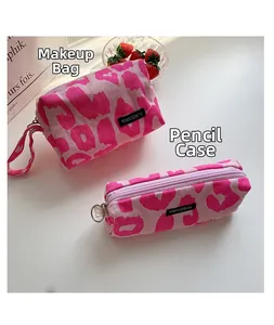 Pink leopard print corduroy pencil case and cosmetic bag with metal zipper detail