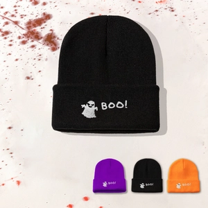 Close-up of Ghost and BOO! embroidery on a black knit beanie with color variations