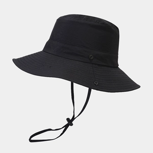 Detail view of black sun hat featuring adjustable windproof cord and reinforced brim stitching
