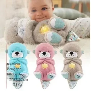 Detailed view of plush breathing otter toys in pink, blue, and brown with light features