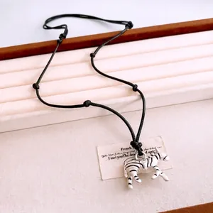 Fashionable zebra pendant necklace with black and white drip oil on adjustable cord