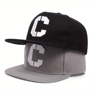 Detail of high-quality cotton snapback caps with 3D letter C embroidery in black and gray