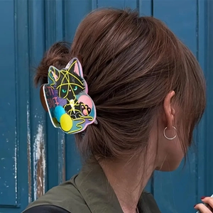 Creative black cat hair claw clip with colorful yarn design and 'ITS FINE' text