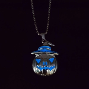 Luminous pumpkin pendant with wizard hat showing blue glow effect on stainless steel chain