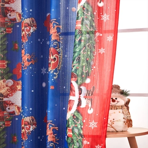 Christmas blackout curtains with Santa and reindeer patterns in red and blue festive designs