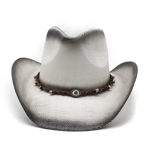 Detail of western cowboy fedora featuring woven band and protective evil eye charm