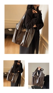 Detail view of large dark brown tote bag showing soft leather texture and outer pocket