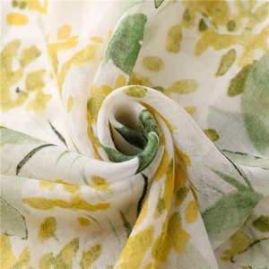 Fresh leaf print cotton linen feel scarf with bright yellow and green foliage patterns