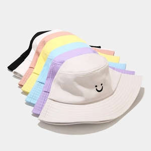 Unisex cotton sun hat with smile embroidery in various pastel colors for summer style
