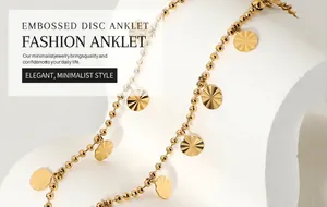 Close-up of 18K gold plated beaded anklet with radial petal textured disk charms