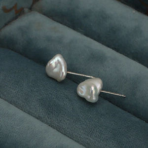 Baroque pearl studs on blue velvet, featuring natural irregular freshwater pearls and S925 silver