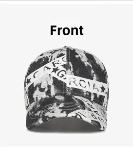 Vue frontale de la casquette tie-dye noir et blanc avec texte GARCIA et imprimé étoile