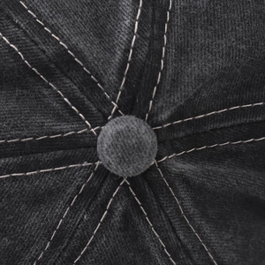 Macro shot of washed cotton baseball cap crown with contrast stitching and top button