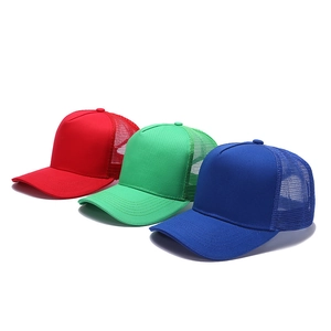 Detailed view of breathable mesh trucker hats in bright red, green, and royal blue colors