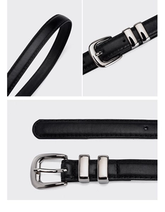Close-up of black leather belt with silver metal buckle and neat stitching details
