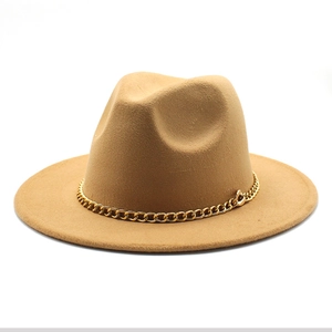 Detailed close-up of a camel wool felt fedora hat featuring a chunky gold chain band