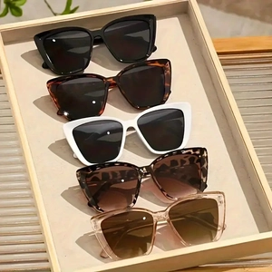 Chic cat eye sunglasses set in multiple colors with large frames and hollow temples