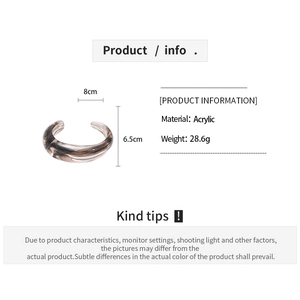 Detail view of amber resin bangle showing dimensions 8cm diameter and 6.5cm height