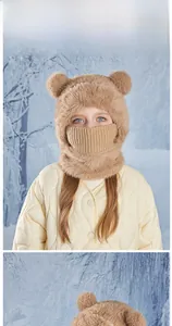Detailed view of child warm winter hat with bear ears and integrated neck warmer scarf