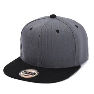 Close-up of hip-hop snapback hat showing gray crown and black flat brim with sticker
