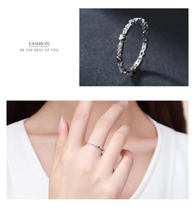 Detailed macro view of S925 silver heart ring with micro-pave cubic zirconia stones