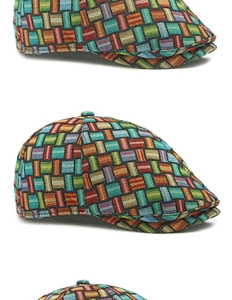 Close-up of colorful jacquard woven geometric pattern on a vintage ivy driving cap