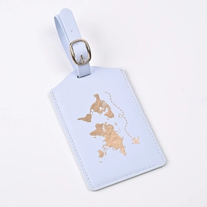 Detail of light blue PU leather luggage tag with gold world map and aircraft pattern