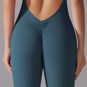 Detail of high-strength yoga jumpsuit featuring scrunch butt design and deep V-back