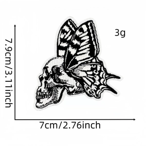 Detail of skull butterfly embroidery patch with size dimensions 7.9x7cm shown on white