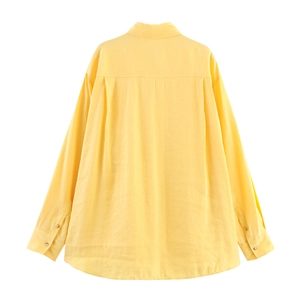 Back view of a yellow long sleeve button-up shirt with loose fit and curved hemline